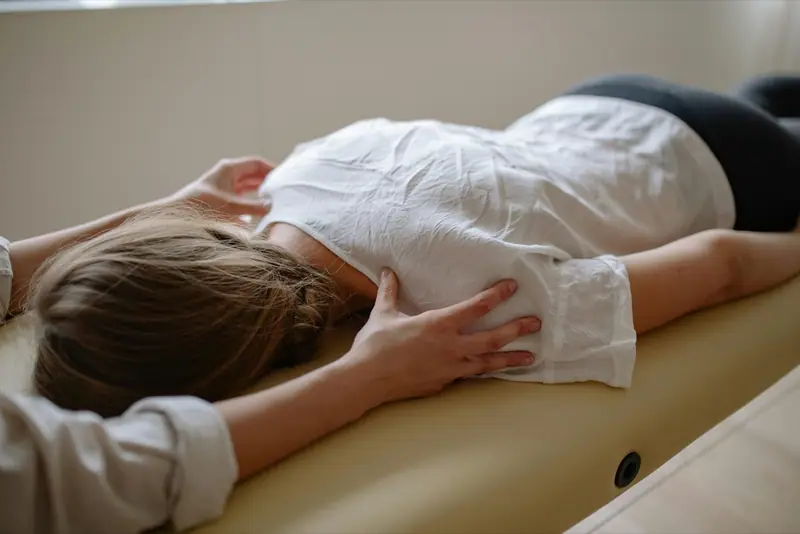 A therapist giving a therapeutic massage
